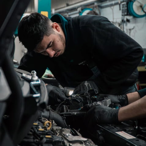 An autobody worker at work